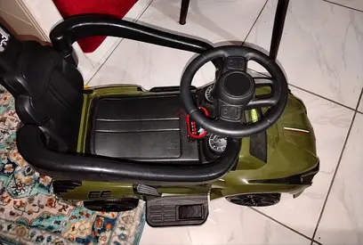 Kids Ride-On Push Car with Steering Wheel and Storage - Green