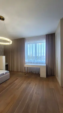 Floor-to-ceiling blackout curtains with sheer panel - set in neutral taupe