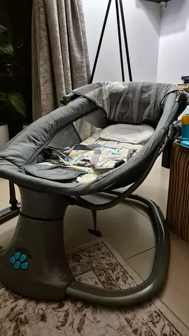 Light grey electric baby bassinet/rocker with canopy - excellent condition.  Hardly used.