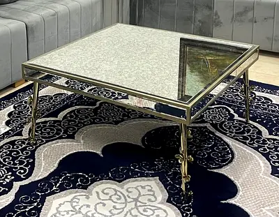 Square mirrored glass coffee table with metal frame