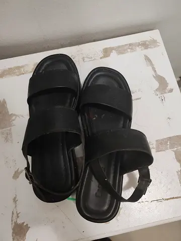 Black womens flat sandals, size not specified — lightly used