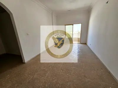 2 bedrooms and living room with balcony, master room with built-in wardrobes, spacious parking area, prime location near all services.