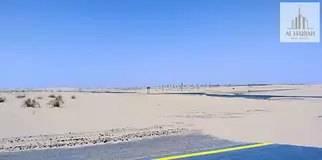 For sale residential and commercial lands in Sharjah Rawdat Al Qurt area Distinctive locations For s