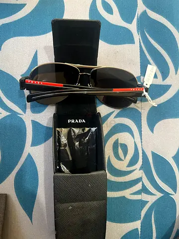 Prada mens aviator sunglasses with case