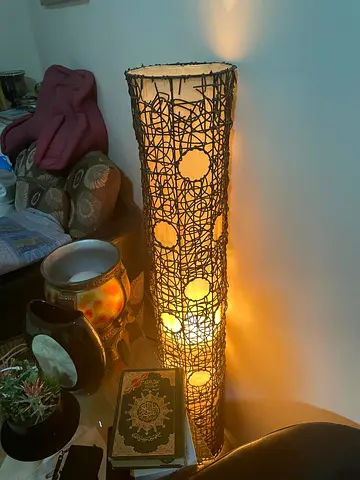 Tall floor lamp with warm ambient light