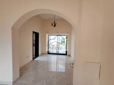 Away from fly zone/ private entrance /3 Bedrooms villa /4 Bathrooms /private back yard/fitted kitchen/4 parking/maid room/available for rent in mirdif