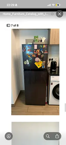 Compact black fridge/freezer in good working condition 230L