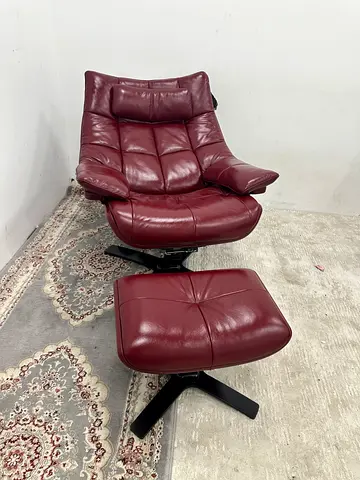 Natuzzi leather arm chair with footstool