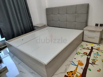 King storage bed with upholstered headboard, matching nightstands  mirror
