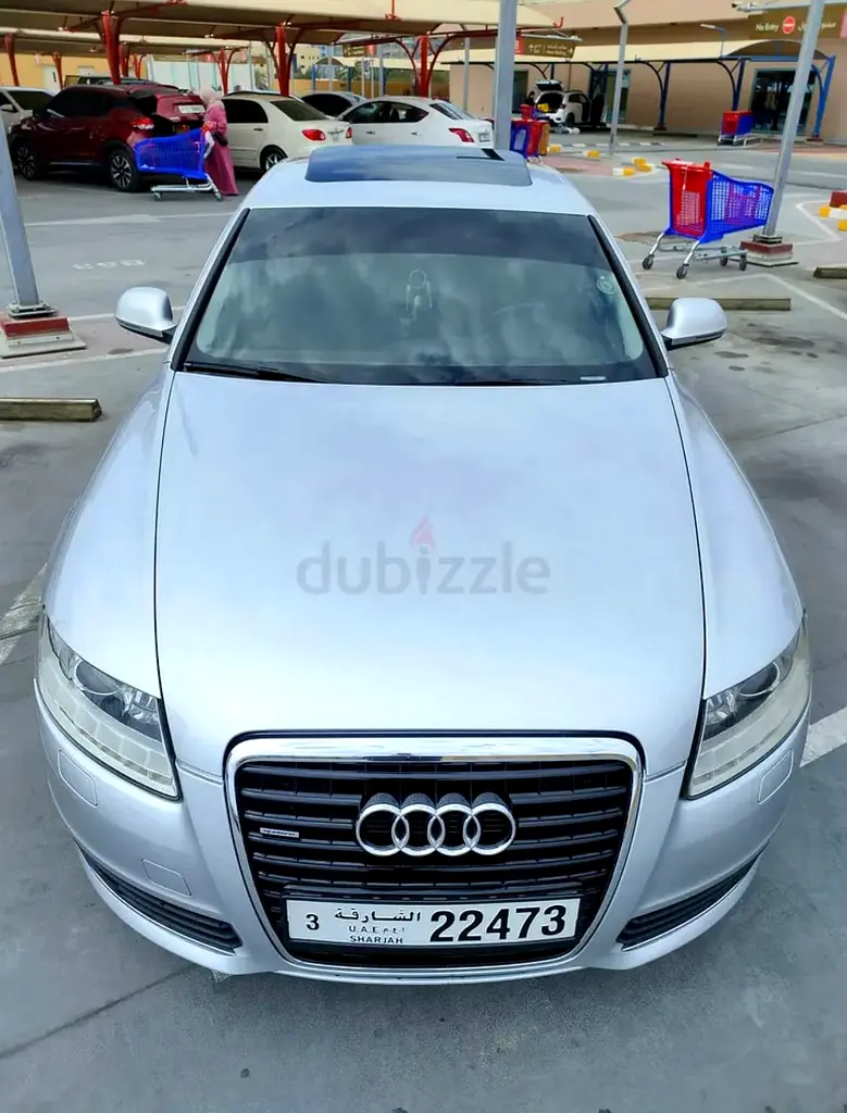 Audi A6 2010 — photo 1 of 13