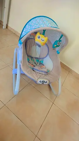 Baby bouncer/rocker with toy arch - gently used