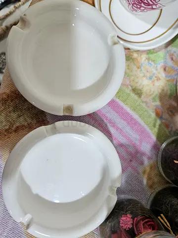 Pair of white ceramic ashtrays - used, good condition