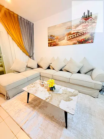 Sharjah, Muwaileh, furnished apartment with hotel-style furnishings, first occupancy, one bedroom, living room, kitchen, bathroom, and balcony.