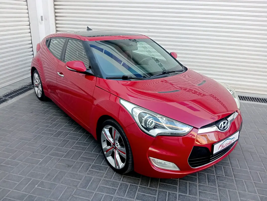 Hyundai Veloster 2014 — photo 1 of 13