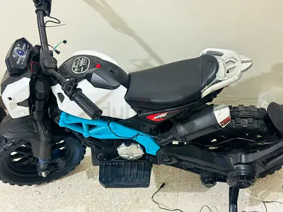Kids Electric Ride-On Dirt Bike - White/Blue