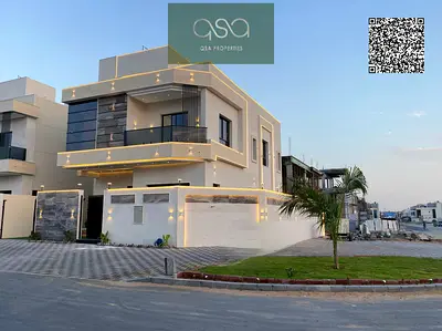 Corner villa for sale in Ajman, Al Helio 2 area, including registration fees and close to all services.