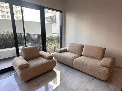 Beige 2-Seater Sofa - Modern Low-Profile, Good Condition