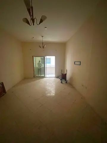 Two-bedroom apartment with a living room for annual rent in Al Taawun, with three bathrooms, central air conditioning, spacious areas, close to all se