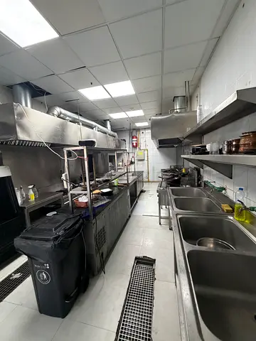 Commercial Kitchen Setup with Stainless Steel Equipment