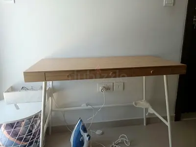 Wooden study desk with three drawers - light oak finish with the chair