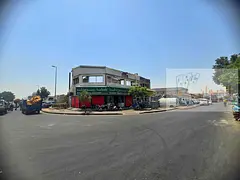 Prime location within the scrap market, corner of two paved streets