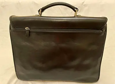 Classic black leather briefcase with top handle — good condition
