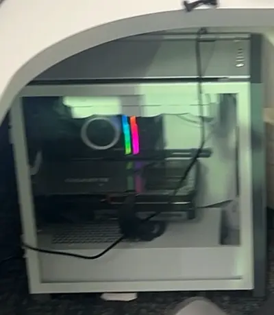 White mid-tower gaming PC with RGB lighting - used