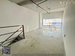 For annual rent: large commercial shop with mezzanine in Al Mowaihat 3 Ajman, Academy Street, prime