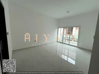 Annual brand new 2BR hall in Al Mowaihat 3 near Saudi German Hospital 2 master rooms 3 baths balcony central AC flexible payment.