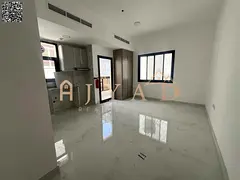 First-tenant studio for annual rent in Al Alia, Ajman. Free month, balcony, central AC, built-in war