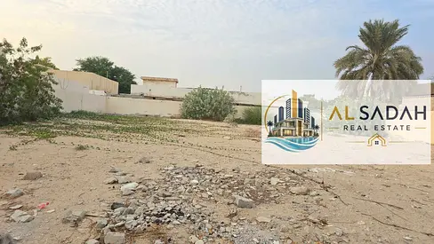Land for sale in Al-Shahbaa, 8000 sq ft, on an 18-meter wide street. Asking price: 850,000