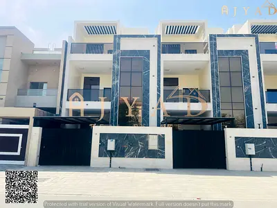 For sale: villa in Al Tala 2 Ajman, 5 master bedrooms, majlis, 3 living rooms, 3 kitchens, maid's room, land 2300 sq ft, built 3000 sq ft, prime area