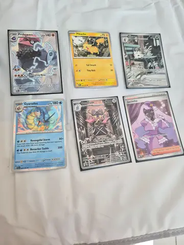 Lot of 6 Pokémon collectible cards - mixed condition