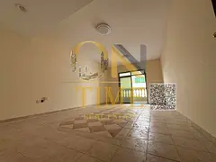 Apartment with separate majlis, spacious layout, and free central gas in a family-friendly building,