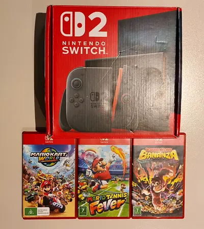 Nintendo Switch 2 Under Warranty + Games