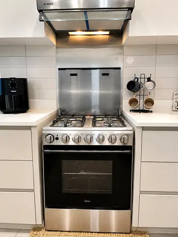 Stainless Steel Gas Range with Oven - Good Working Condition