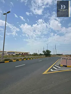 Industrial land for sale in Sajaa, multi-use, freehold for all nationalities, on the main road with