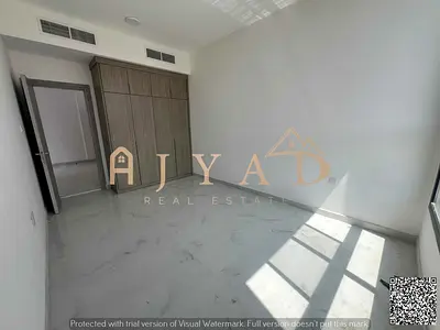 For annual rent, first occupancy, beautiful one-bedroom apartment in Al Alia area, near Sheikh Mohammed Bin Zayed Road, with built-in wardrobes