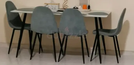 Dining table with 4 blue upholstered chairs - good condition