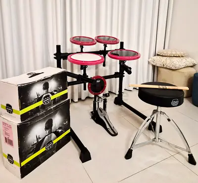 REMO Practice pads with MAPEX Package Pedal throne and sticks .