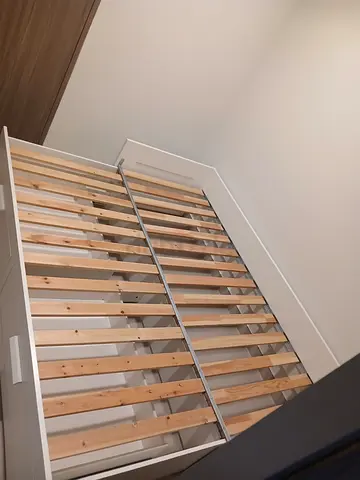 White wooden single bed frame with slatted base {IKEA}