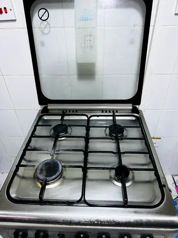 Used 4-Burner Stainless Steel Gas Hob with Glass Cover - Good Working Condition