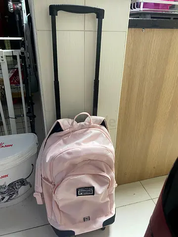 Light Pink Puma Rolling Backpack - Good Condition