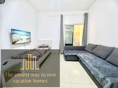 Central 1BR – Quick Commute to Dubai