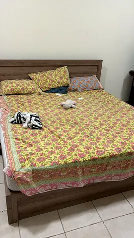 Wooden double bed frame with mattress