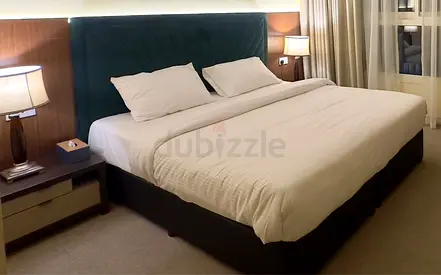 King upholstered bed frame with padded headboard - dark teal