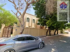 For rent a villa with 2 living 5  rooms and a maid's room