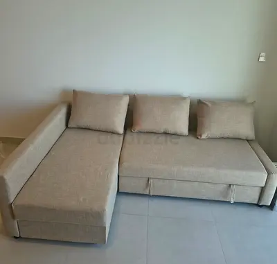 Ikea L Shape Sofa cum bed with big storage in L