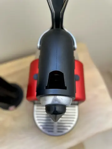 Nespresso coffee machine and capsules dispenser