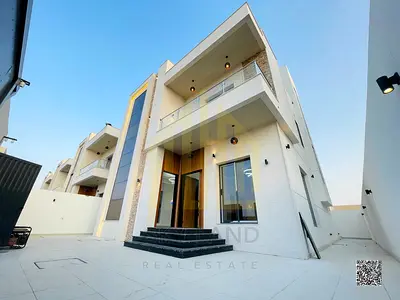 Modern villa in Al Yasmin, two floors and a roof, with luxurious finishes, including registration fees, modern design and spacious areas.